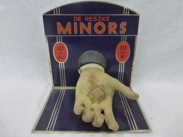 An unusual advertising display in the form of an open hand holding a tablet of De Reszke Minors