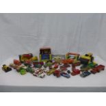 A box of assorted play worn Dinky and Corgi die-cast, some in original boxes.