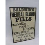 A framed and glazed advertising poster for Baldwin's Herbal Blood Pills with interesting cure