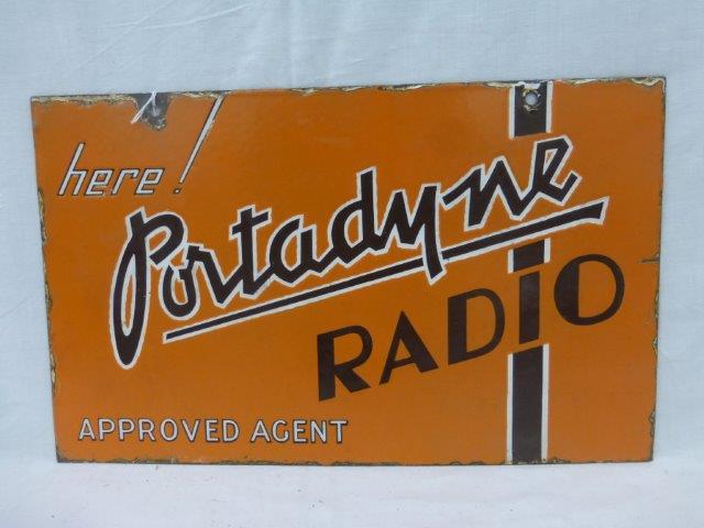 A Portadyne Radio Approved Agent double sided hanging enamel sign, with a patch of restoration to