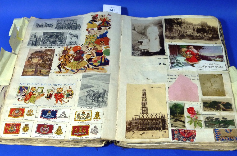 An early 20thC Scrapbook, formerly an estate auction catalogue, containing cigarette cards,