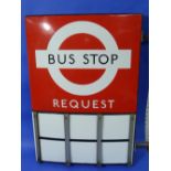 A London Transport Request Bus Stop, by Burnham, London, the enamelled metal rectangular