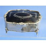 An antique Sterling silver Evening Purse, the bowl-shaped chased foliate lower part with draw-string