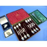 A mixed collection of twelve silver Teaspoons and Sugar Nips, various marks, in presentation case,