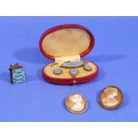 A boxed set of three Studs and a Brooch in pale blue and white enamel, in original leather case; a