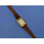 A vintage Zenith 9ct gold rectangular wristwatch, circa 1950, the Swiss movement numbered 3161161,