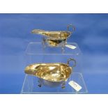 A George V pair of silver Sauce Boats, by Mappin & Webb, hallmarked 1913, of ovoid form with