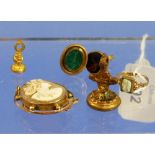 A Shell Cameo, mounted in 9ct yellow gold together with a small shell cameo ring in 9ct yellow gold,