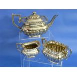 An Edwardian silver three-piece Tea Set, by Robert Pringle & Sons, hallmarked London, 1907 and 1908,