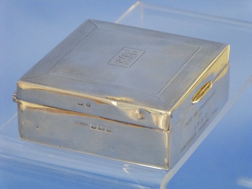 A George VI silver Cigarette Box, hallmarked Birmingham, 1951, of square form with engine-turned