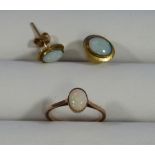 A pair of oval opal Earrings, mounted in 9ct yellow gold together with an oval opal ring mounted