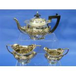 A matched Edwardian silver three-piece Tea Set, the teapot by John Edward Wilmot, hallmarked