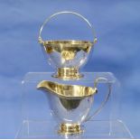 A Tiffany & Co. sterling silver Cream Jug and Sugar Bowl, circa 1930's, marked on the bases "Tiffany