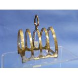 A George V silver Toast Rack, by Viner's Ltd, hallmarked Sheffield, 1935, with five Gothic arched