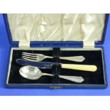 A George VI silver and steel Knife, Fork and Spoon set, hallmarked Sheffield, 1947, in fitted