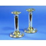 A pair of Edwardian silver Candlesticks, hallmarked Birmingham, 1907, of plain column form with