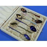 A set of six continental silver gilt and coloured enamel Coffee Spoons, by David Andersen, circa