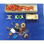 A collection of Costume Jewellery, including three coral branch necklets, rings, brooches, other