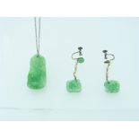 A jade Pendant and pair of Earrings, the oblong pendant pierced and engraved with fruit and flowers,