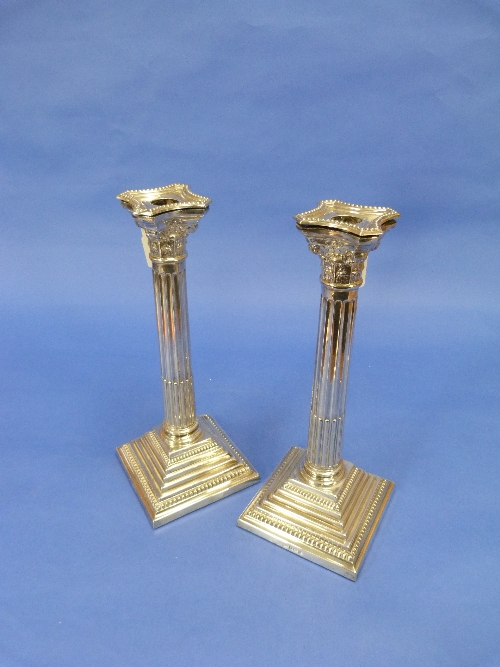 A pair of George V silver Candlesticks, by Britton Gould & Co, hallmarked Birmingham, 1926, the