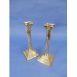 A pair of George V silver Candlesticks, by Britton Gould & Co, hallmarked Birmingham, 1926, the