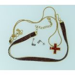 A Swarovski topaz coloured crystals set into a cross, all mounted in gilt metal and on gilt metal