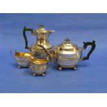 An Edwardian silver four-piece Tea and Coffee Service, by Thomas Bradbury & Sons, hallmarked London,