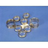 A set of six Edwardian silver Napkin Rings, hallmarked Chester, 1901, of plain circular form, 1½