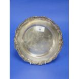 A continental silver circular Platter, marked on the base "Industria Peruana Plata Esterlina 925