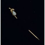 An 18ct yellow gold Stickpin, the finial in the form of a fruit, set with an oval opal and two small