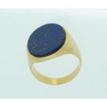 A gentleman's 18k yellow gold Signet Ring, the front set with a plain oval Lapis Lazuli, Size O.