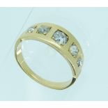 A graduated five stone diamond Ring, each brilliant cut diamond separately square set in the