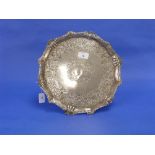 An antique Irish silver Salver, Dublin hallmarks, the shaped rim with shell and gadroon border, on