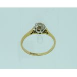 A solitaire diamond Ring, c.½, mounted in platinum with an 18ct yellow gold shank, Size O.