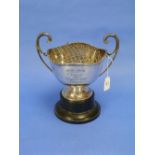 A George V silver Trophy Cup, hallmarked Sheffield, 1928, of circular form with wavy-rim, scroll