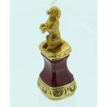 A miniature Desk Seal, c.1820, the base set with a bloodstone engraved with a crouching rabbit,