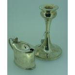 A George V silver Candlestick, hallmarked Birmingham, 1933, 5½in (14cm) high, together with a silver