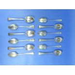 A set of twelve Edwardian silver dessert Spoons, by Josiah Williams & Co, hallmarked London, 1907,