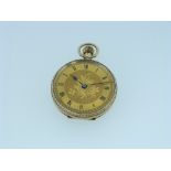 A 9ct gold lady's Pocket Watch, the circular gilt florally engraved dial with black Roman