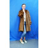 A vintage long hair Honey Mink 'Duster' Coat, with swing back and turned-back wide cuffs, by