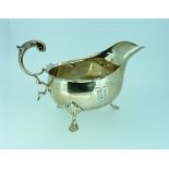 An Edwardian silver Sauce Boat, by William Aitken, hallmarked Birmingham, 1906, of oval form with