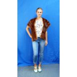 A vintage Musquash fur full length Coat, by Bijou Furs Ltd., lined with two-tone satin, approx. size