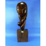 A contemporary elm carving of the Head of Woman, of stylized elongated form on a block base, 32in (