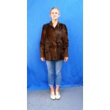 A vintage dark brown Pony Fur Coat, made by Adderleys Furriers, Leicester, approx. size S. THIS