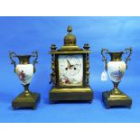 A late 19thC French gilt metal and porcelain three-piece Clock Garniture, the mantel clock of