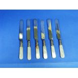 A vintage cased set of six mother-of-pearl handled Cake Knives, with silver plated collars and