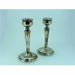 A pair of George V silver Candlesticks, by William J Holmes, hallmarked Birmingham, 1922, with