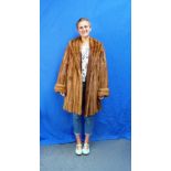 A vintage fur 'Duster' Coat, stained to have the appearance of mink, with wide sleeves and turned