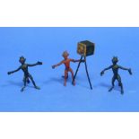 A three-piece Austrian cold-painted bronze whimsical Devil Photograph group, comprising a red