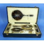 A George V five-piece silver and tortoiseshell Toilet Set, by Levi & Salaman, hallmarked Birmingham,